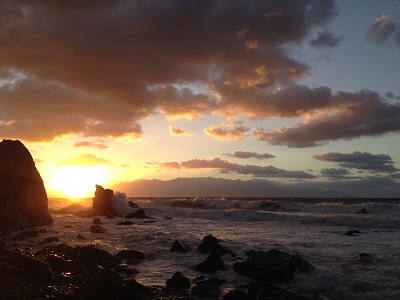 Sunset Next To Yakushima With Clouds And Bright Glow